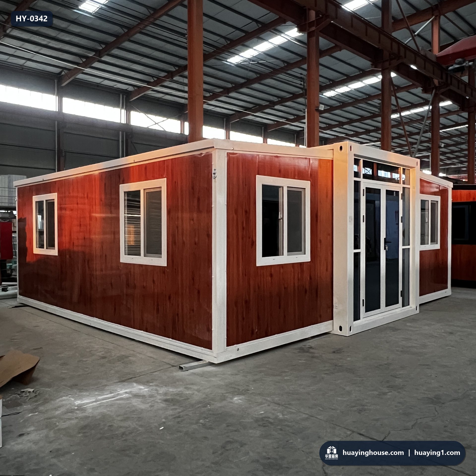 Huaying 20ft expandable container house photographed on the factory apron before export crating